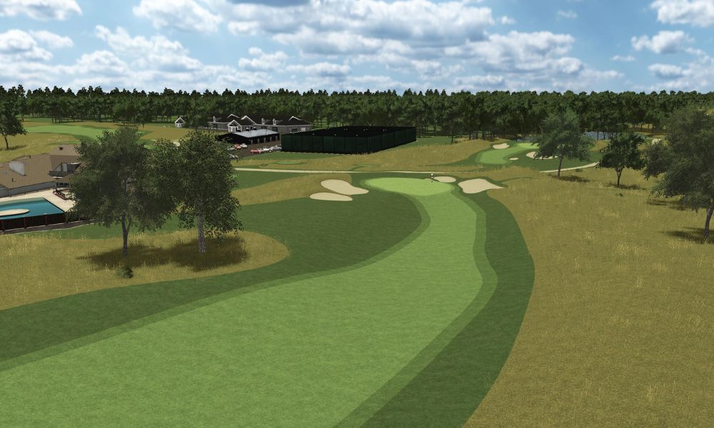 Golf course with green fairway and trees under a blue sky