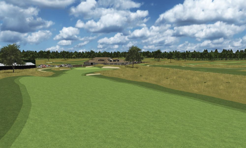 Golf course with green grass and a clear sky