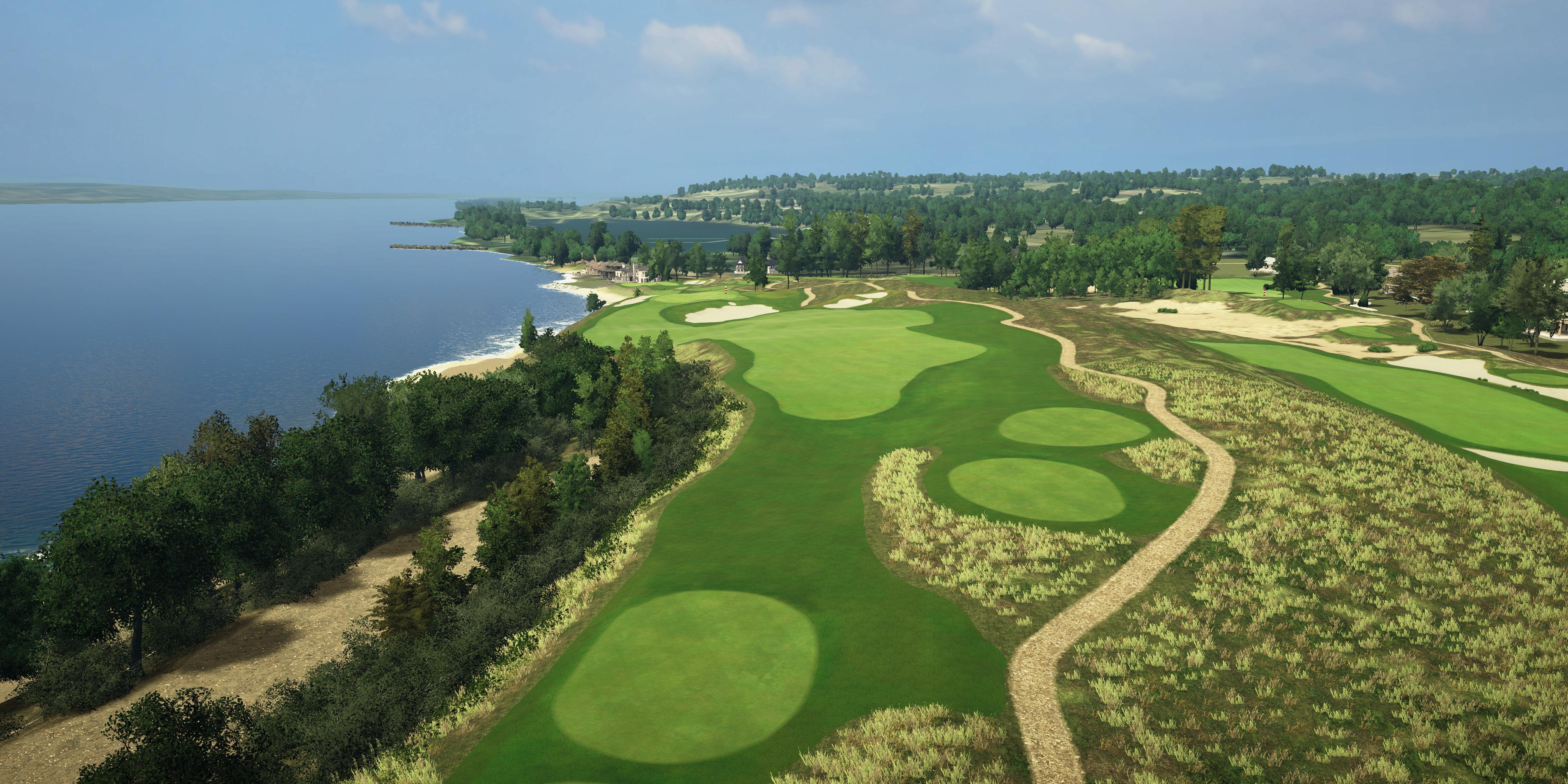 Golf course with green fairways and a lake in the background