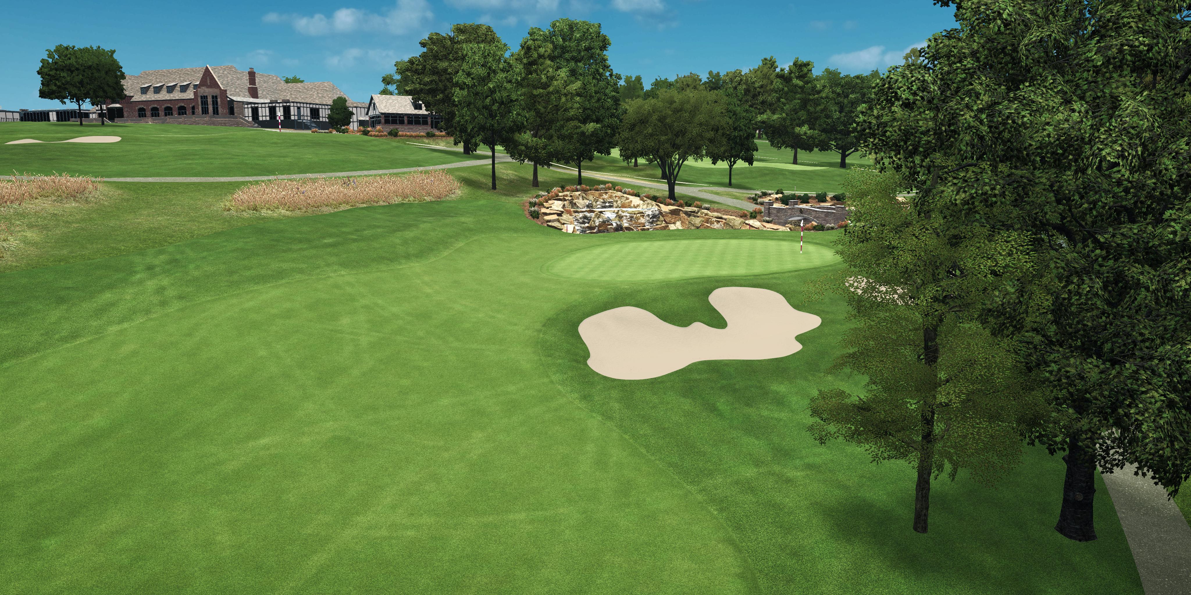 Golf course with a sand trap and clubhouse in the background