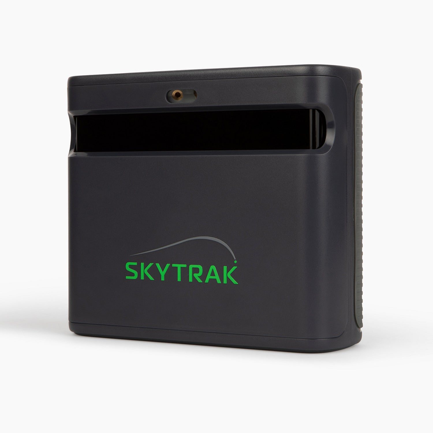 SkyTrak launch monitor hardware unit in a three-quarter front perspective view, showing the centered green logo branding and the upper recessed optical camera tracking lens window strip.